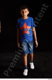 Timbo  1 blue t shirt dressed jeans shorts walking…